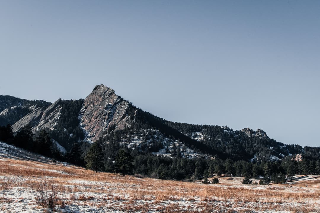 The snow-dusted Flatirons above Boulder, Colorado.