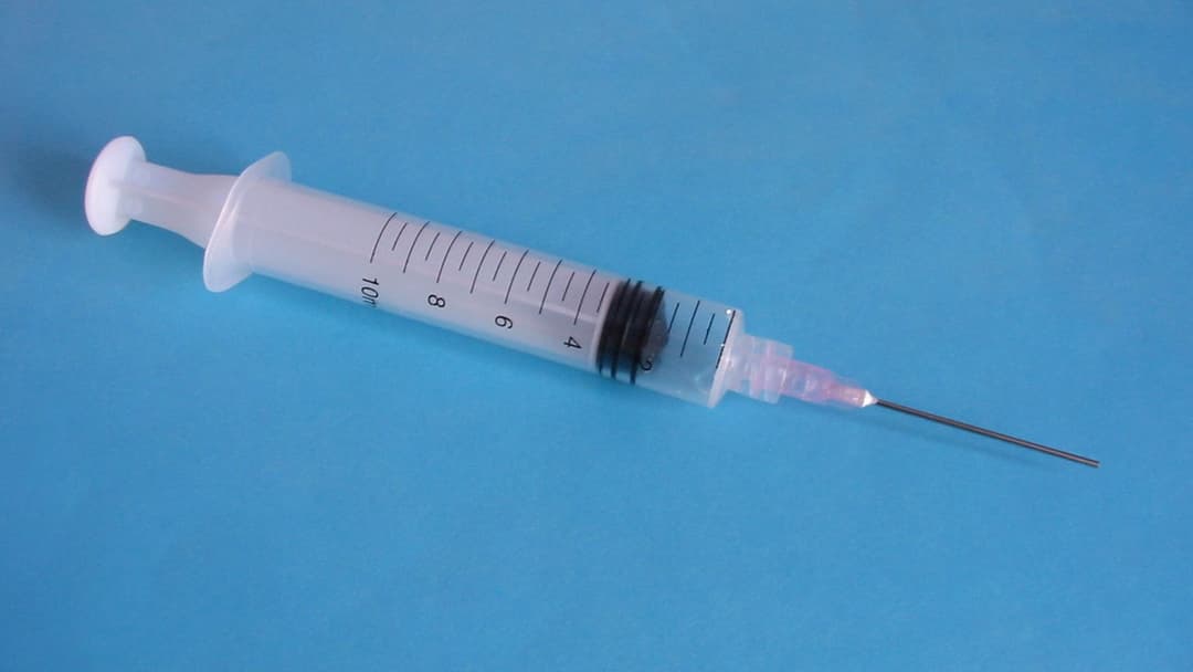 A standard syringe with hypodermic needle. PeRx patients use smaller insulin-type syringes for subcutaneous peptide injections.