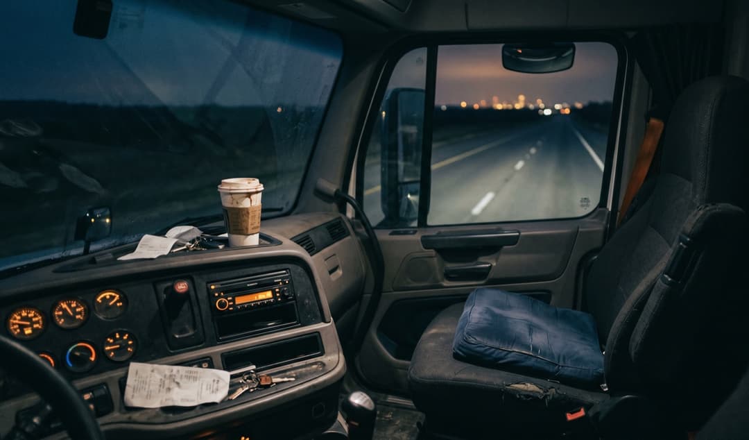 The cabin at the end of a long stretch, coffee long cold and city lights still hours away.