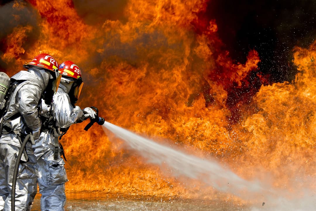 Firefighters and medics carry the job on two fronts: sleep shredded by alarm-driven wakeups, and the lumbar and joint load of gear weight and extrications.