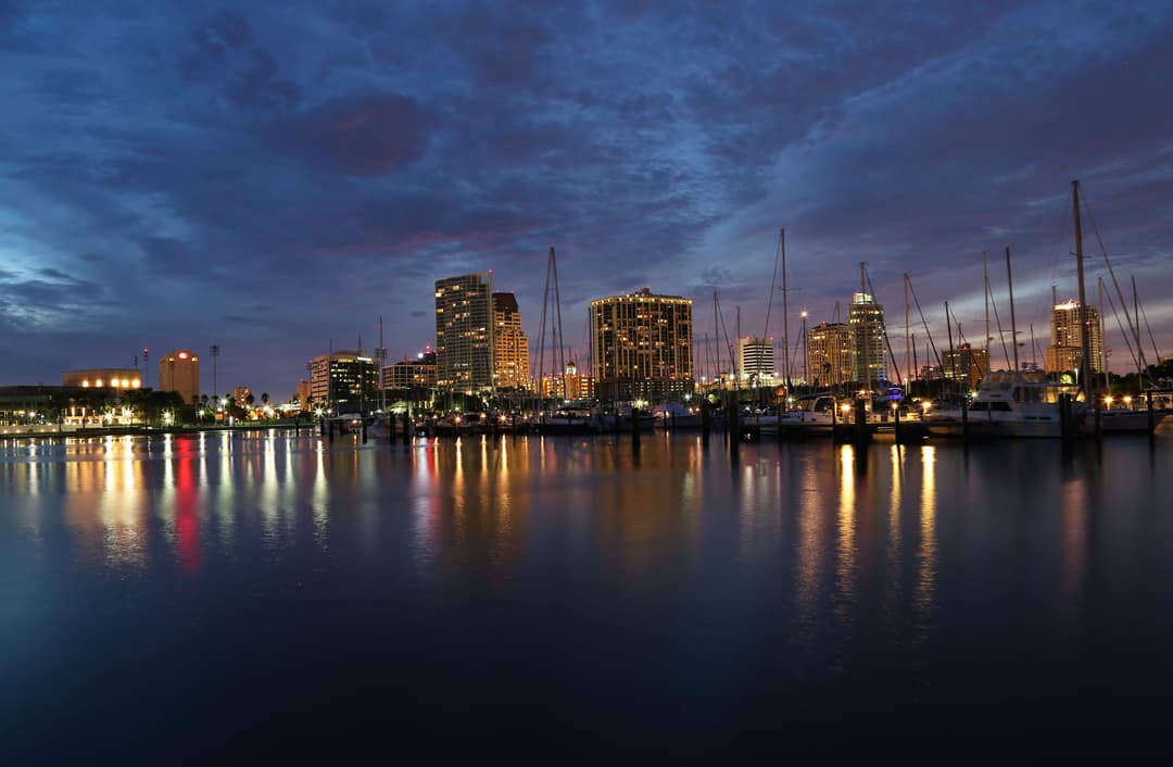 St. Petersburg, Florida: the downtown waterfront marina on Tampa Bay at dusk, gateway to the Pinellas beach towns.