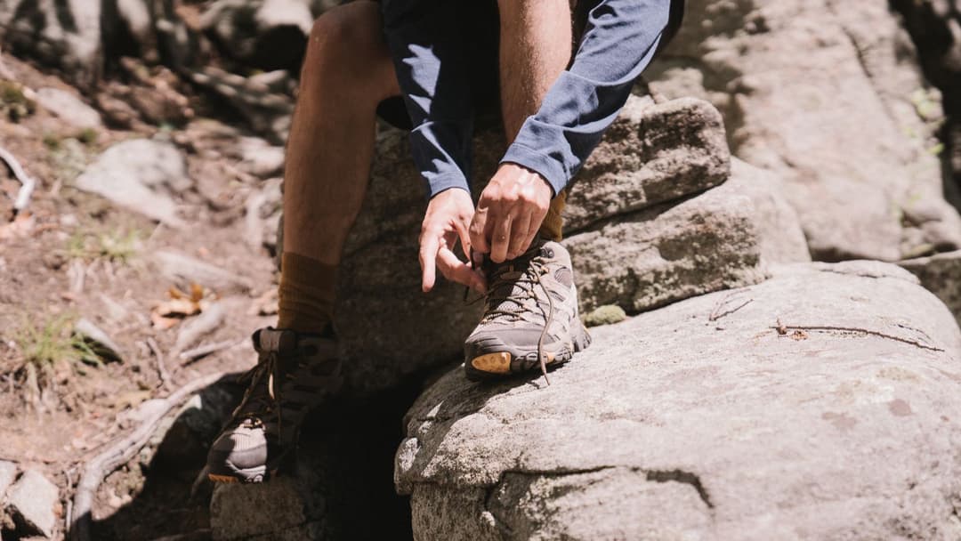 Lacing up on the trail. The wolverine stack schedule is built around the same habit: same time, every day.
